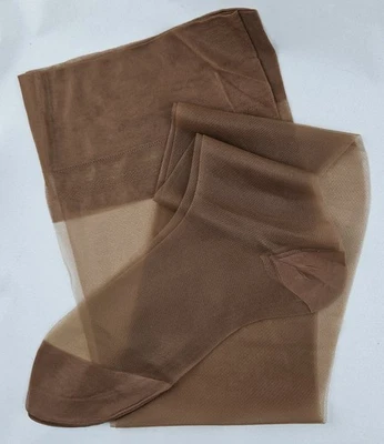 Medias de nailon transparentes sin costuras vintage para damas medias de cobre 9 1/2 M nunca usadas Foto 1 de 4