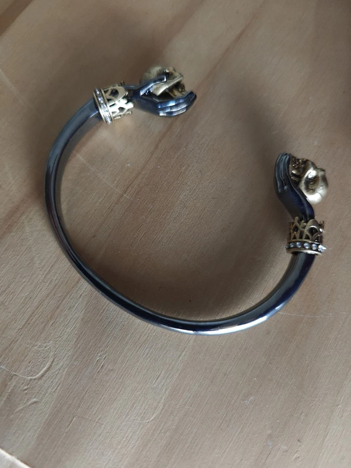 Pulseira Alexander McQueen esqueleto duplo preto/dourado - Imagem 1 de 4