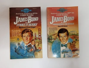 Two paperback books, James Bond in Strike It Deadly and Programmed for Danger YA - Picture 1 of 17