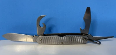 Cuchillo de campamento plegable Camillus 1991 acero inoxidable ejército militar de Estados Unidos marina multiherramienta en muy buena condición Foto 1 de 4