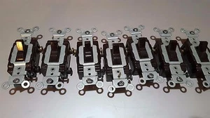 QTY: 7 -  Leviton	5523-2B	COMMERCIAL 3-Way Toggle Wall Light Switch 20A Brown - Picture 1 of 3