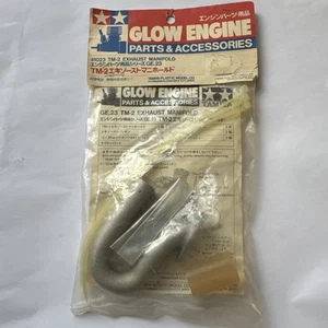 NEW TAMIYA TGX 1/8 RC CAR TM-2 Exhaust manifold 41023 RARE - Picture 1 of 4