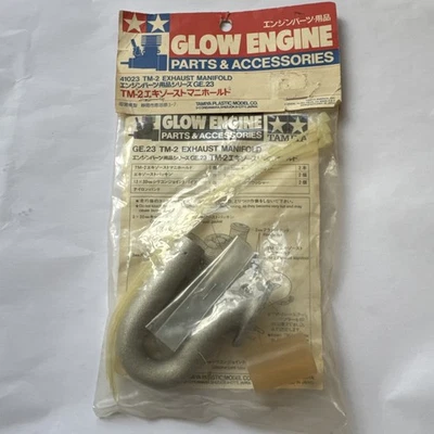 NEW TAMIYA TGX 1/8 RC CAR TM-2 Exhaust manifold 41023 RARE  - Image 1 of 4