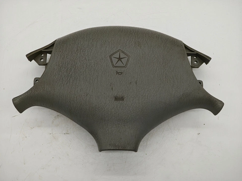 Bolsa de aire para volante de conductor Plymouth Grand Voyager 2000 OEM 1016373-1 Foto 1 de 4