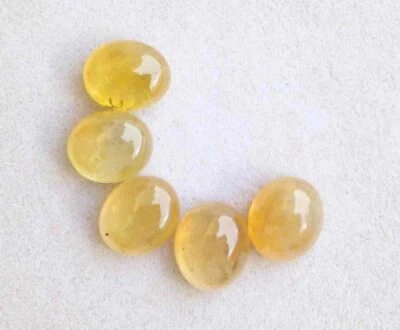 Piedra preciosa suelta cabujón zafiro amarillo forma ovalada natural de 13,70 quilates Foto 1 de 2