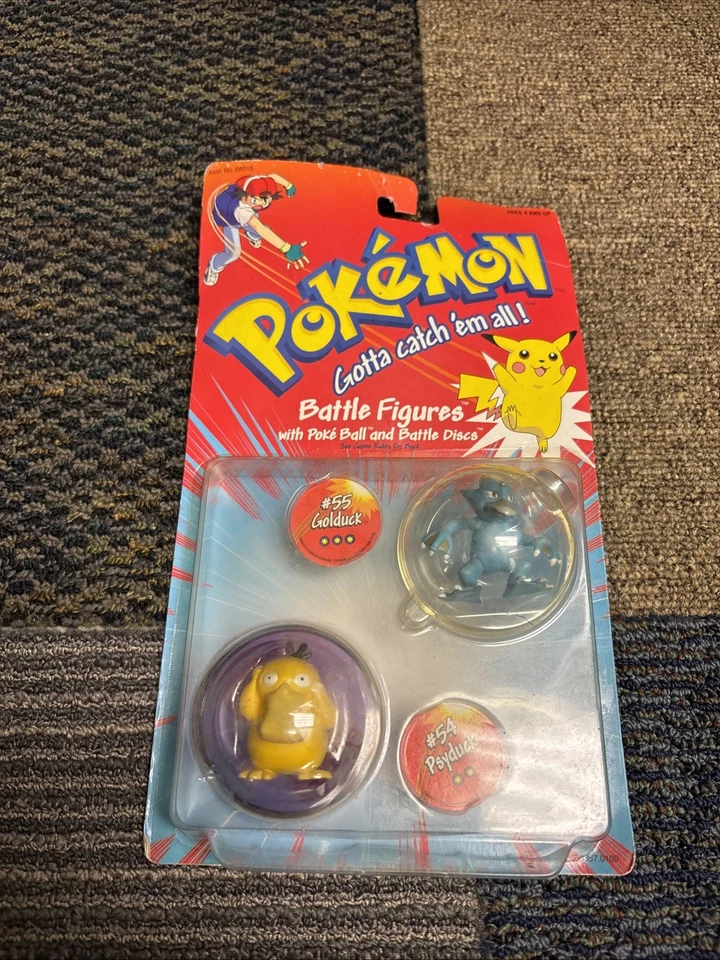 Figuras de batalha Hasbro Pokémon Psyduck e Golduck 1999 com bola e discos fechados - Imagem 1 de 4