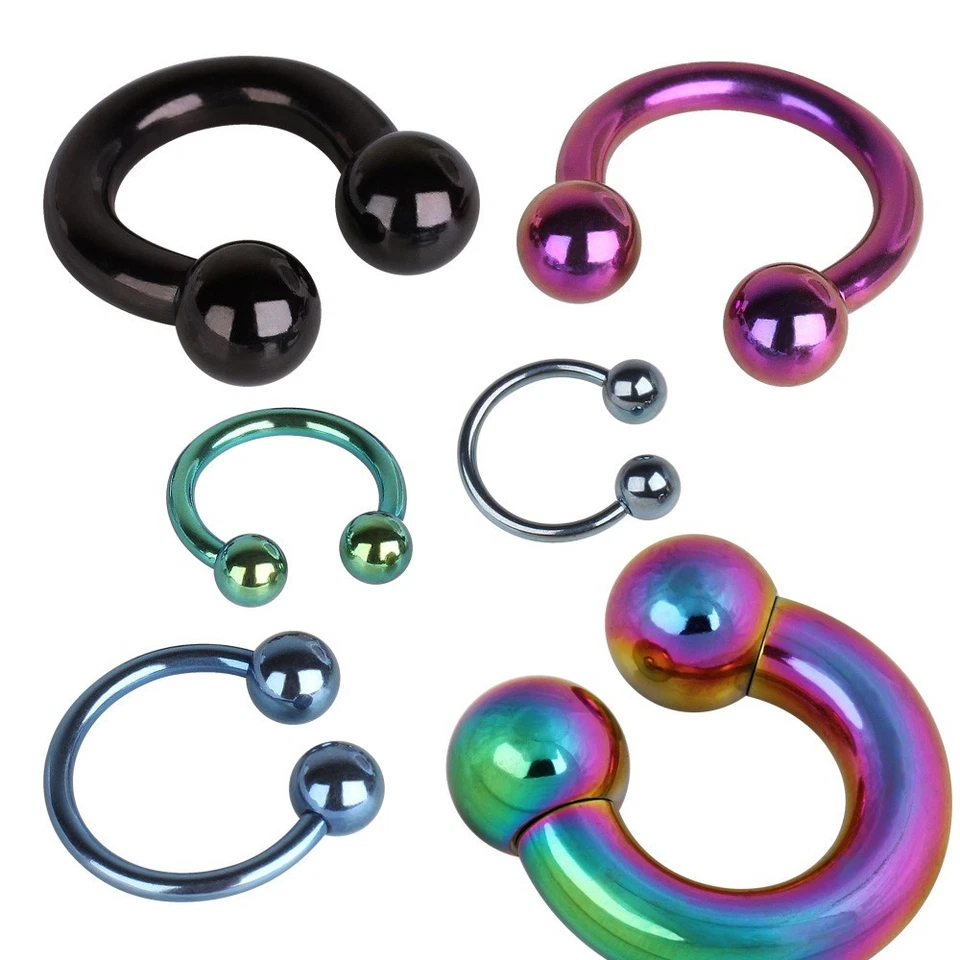 Herradura de acero quirúrgico enchapado en PVD con bolas Foto 1 de 3