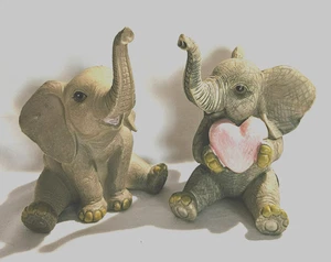 Set of 2 Sitting 11cm Baby Elephants with Trunk Up Ornaments - Bild 1 von 3