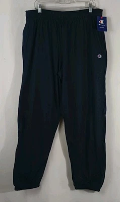 Pantalones deportivos Champion azul marino con bolsillos elásticos en la cintura con cordón para hombre talla XXL Foto 1 de 4