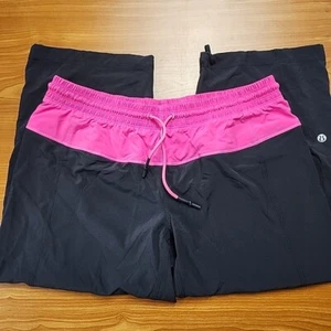 Lululemon Wide Leg Capri Yoga Pants Ankle Drawstring Back Pocket Sz 8 Black/Pink - Picture 1 of 12