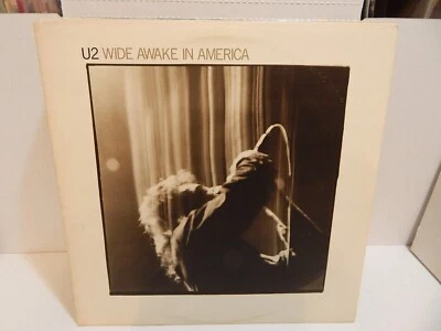 U2 - Wide Awake In America BONO 1985 Island Records Vinyl, 12", 33 ⅓ RPM, EP - Image 1 of 2