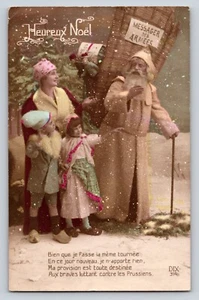 Cartolina RPPC Natale rosa Babbo Natale bambole colorate caino heureux noel ragazzo ragazza - Foto 1 di 2