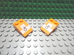 Lego 2 Orange 3x2 sloped brick printed with design - Imagen 1 de 1