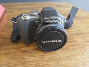 Olympus SP-550UZ 7.1MP Digital Bridge Camera Silver - Picture 1 of 7