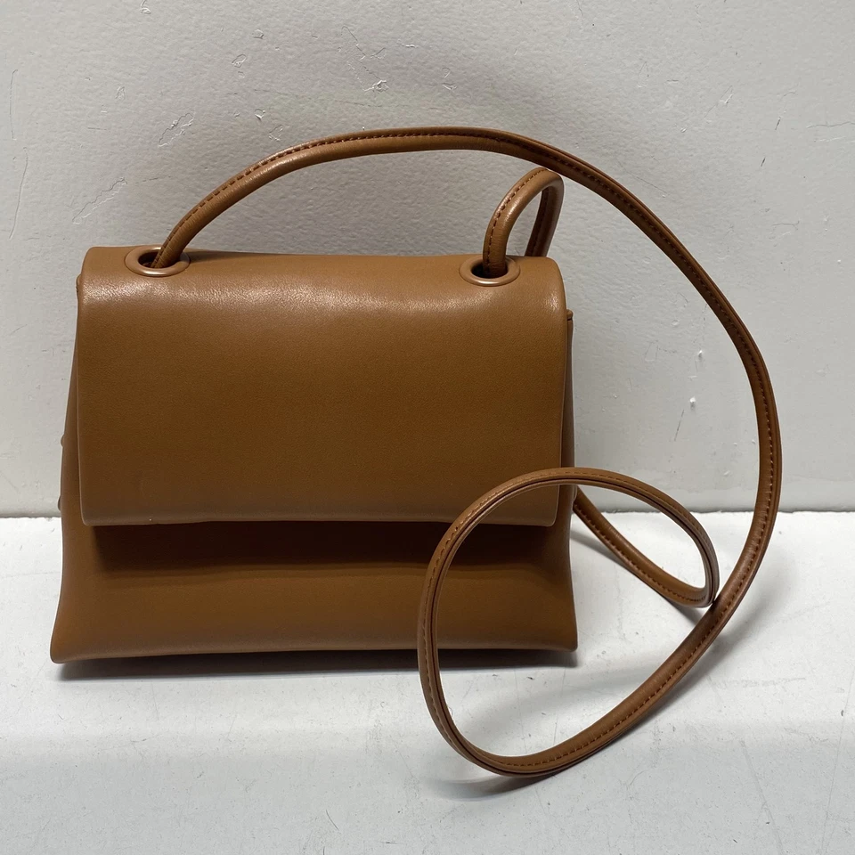 Bolso cálido Studio de cuero marrón con asa superior Foto 1 de 4