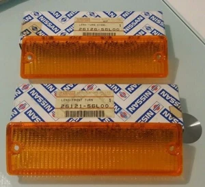 Coppia plastiche Frecce fanalini NISSAN D21 pick up 2612156L00 2612656L00 - Foto 1 di 1
