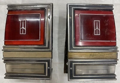 Lámpara de luz trasera Cutlass Cruiser 1980-90 Oldsmobile par de lentes de respaldo inverso Foto 1 de 4