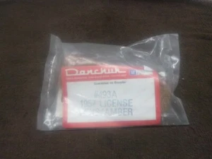 1957 Chevrolet Car License Plate Light Lens Amber New Danchuk Part # 493A - Afbeelding 1 van 3