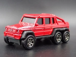 2013 - 2015 Mercedes Benz G63 AMG 6X6 G Carro Rosso 1/64 Scala Modellino Auto - Foto 1 di 7
