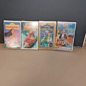 VHS Filme Zauberer von OZ, Peter Pan, Pocahontas, Tarzan, Disney versiegelt Lot 4 - Bild 1 von 3