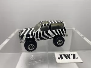 Matchbox FORD BRONCO LL 1987 - STRISCE BIANCO E NERO - Raro 1:57 - Foto 1 di 8