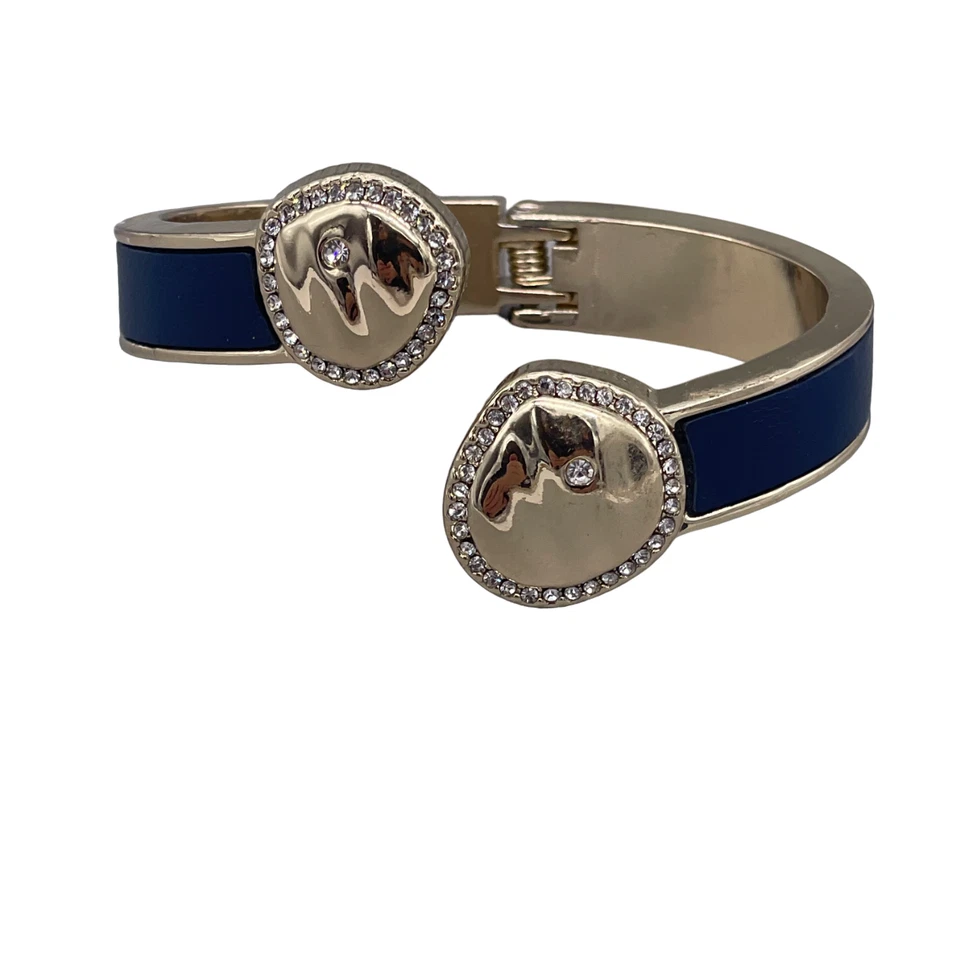 Brazalete con bisagras de diamantes de imitación del mercado negro de la Casa Blanca tono dorado azul Foto 1 de 4