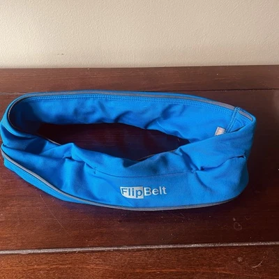 Cinturón para correr FlipBelt azul brillante edición clásica con bolsillos talla mediana Foto 1 de 4