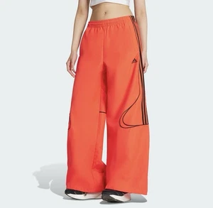 Adidas Damen Teamgeist Adicolor Oversized Woven Trainingshose Orange Größe Large - Bild 1 von 7