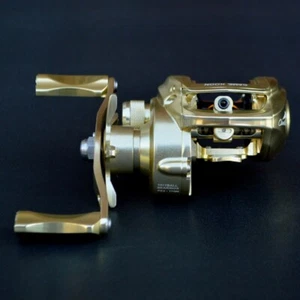 Carrete baitcaster de pesca de agua salada tamaño 200 7,3:1 cuerpo de metal mano derecha 15 lb arrastre - Imagen 1 de 5