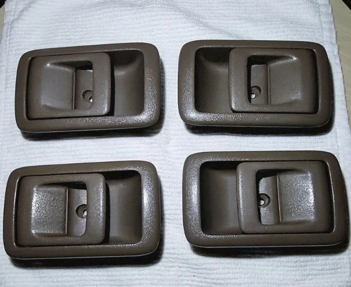 Juego de 4 manijas de puerta interiores Toyota 4runner 98 OEM genuinas usadas Foto 1 de 3