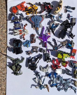 Transformers Huge Mixed lot 30+ Figures Vintage & Modern Incomplete + Parts - Image 1 of 4
