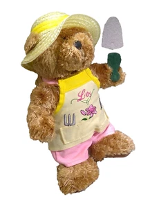Galerie Lily Jardinería Peluche Oso de Peluche Sombrero de Paja Sosteniendo Paleta Delantal 11" H - Imagen 1 de 10