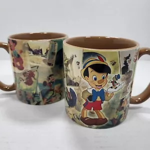 2 Disney Store Exclusive Pinocchio 16oz Coffee Mugs Movie Scenes Jiminy Cricket - Picture 1 of 9
