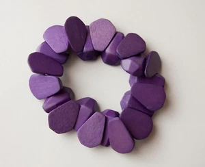 BRACCIALETTO VIOLA IN LEGNO - Foto 1 di 1