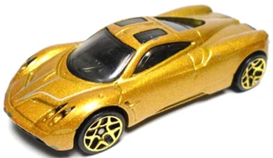 2012 HOT WHEELS PAGANI HUAYRA GOLD 1:64 DIECAST 2 3/4" CAR WITH SILVER STRIPES - Picture 1 of 6