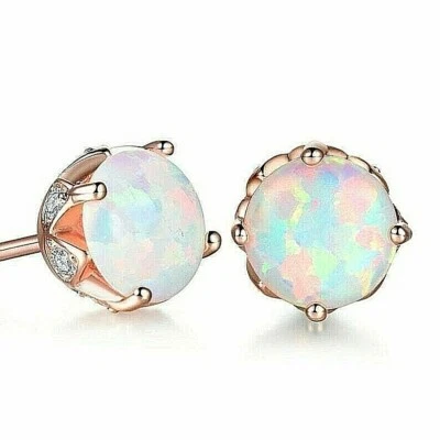 Hermosos aretes clásicos de oro rosa de 18 quilates rellenos de ópalo de fuego y cristal  Foto 1 de 4