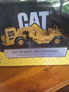 1/64 Norscot Caterpillar 611 Wheel Tractor Scraper #55303 - Picture 1 of 1