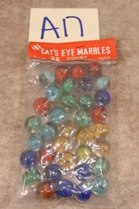 A17B VINTAGE 35 STÜCK BEUTEL KATZENAUGE MURMELN JAPAN - Bild 1 von 1