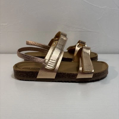 Steve Madden Adouble Niñas Talla 4 Dorado Sin Cordones Gancho y Lazo Sandalias Planas NUEVAS Foto 1 de 4