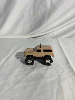 Schaper Chevrolet Stomper 4x4, Tan With Green Stripes Blazer - Image 1 of 4