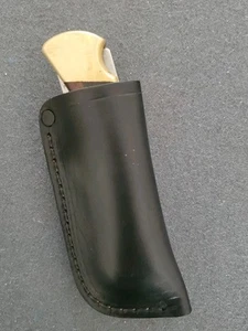 Vertically carried, Fits Buck 110 . Friction sheath. Belt Clip, Right hand. - Picture 1 of 3