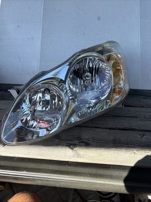 Faro lateral izquierdo Toyota Corolla 2005-2008 OEM M0654 DG como está Foto 1 de 4