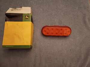 JOHN DEERE T246236 TURN SIGNAL ORANGE NEW GENUINE - Picture 1 of 7