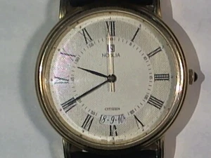 Nobla by Citizen thin dress watch with ivory dial and Roman numeral indices - Picture 1 of 8
