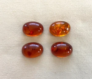 De colección 4 piedras preciosas sueltas cabujón ovalado de 18 x 13 mm ámbar báltico nuevas de stock - Imagen 1 de 10