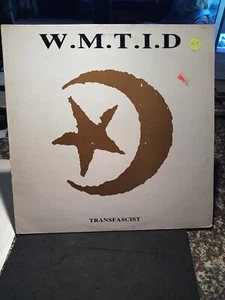 W.M.T.I.D TRANFASCIST ROUSKA RED RHINO MADE IN ENGLAND EXCELLENT  - Picture 1 of 22