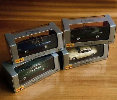 QUATTRO JAGUAR XK8 e MK II (1959-1996)-MAISTO 31501/3- 1/43 -CLASSIC COLL.-NUOVE - Immagine 1 di 4