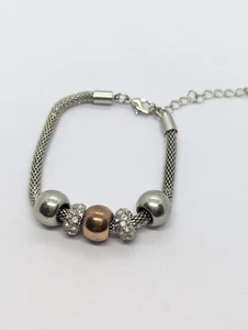 Next Silberfarbenes klobiges Perlenarmband - Bild 1 von 6