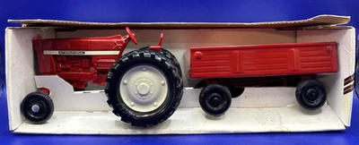 1984 Ertl 1:32 International Harvester Tractor/Wagon- NIB- Steel Wagon- USA Made - Image 1 of 4
