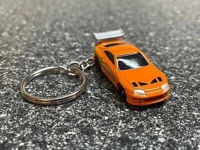 Mini chaveiro Hot Wheels laranja Toyota Supra F&F caixa de fósforos - Imagem 1 de 4